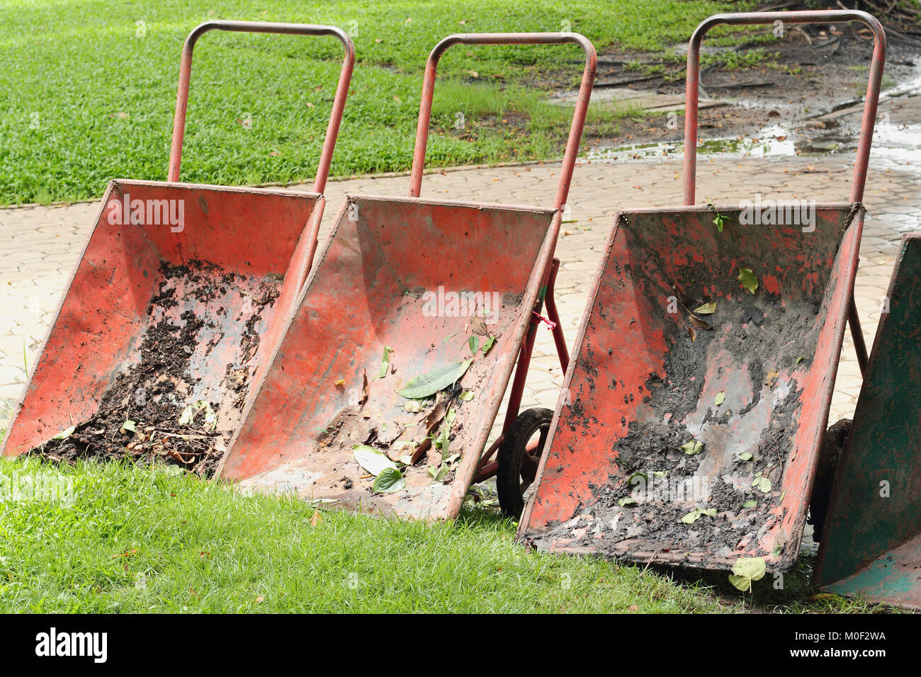 old Wheelbarrow in the garden Stock Photo Alamy