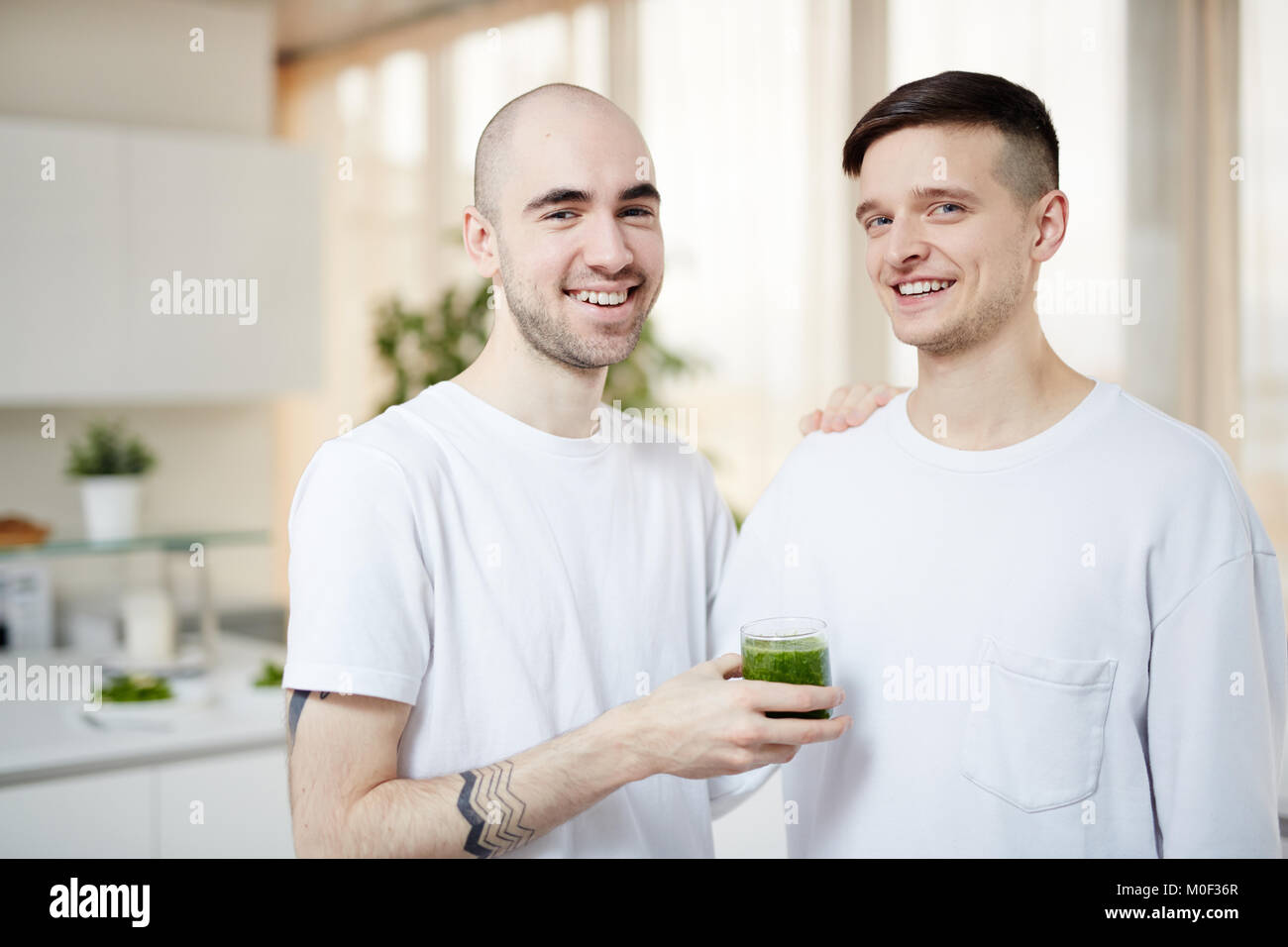Men with vegetable cocktail Stock Photo