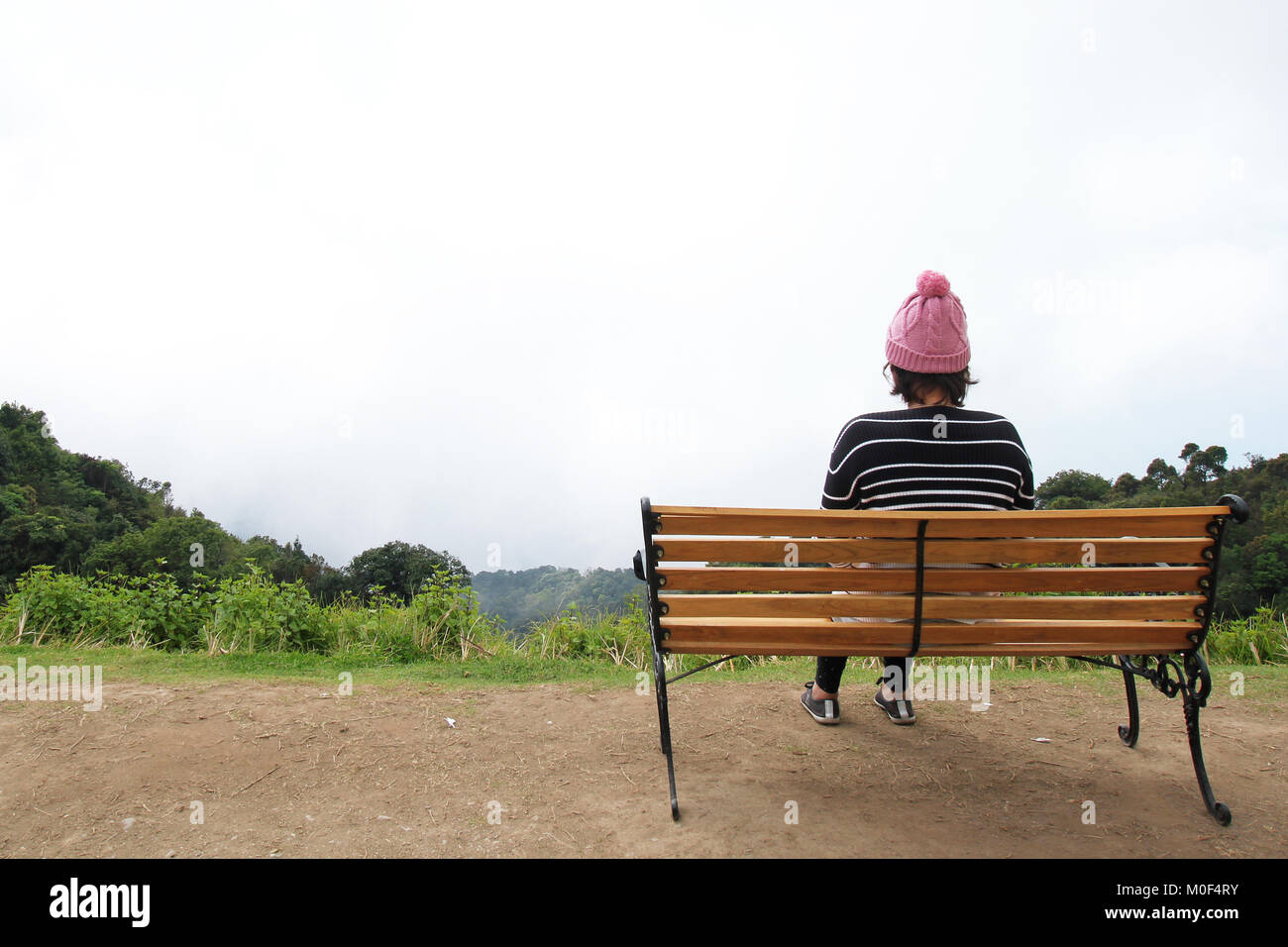Lonely Women Sitting Alone On The Mountain In Winter Season At Chiang Stock Photo Alamy