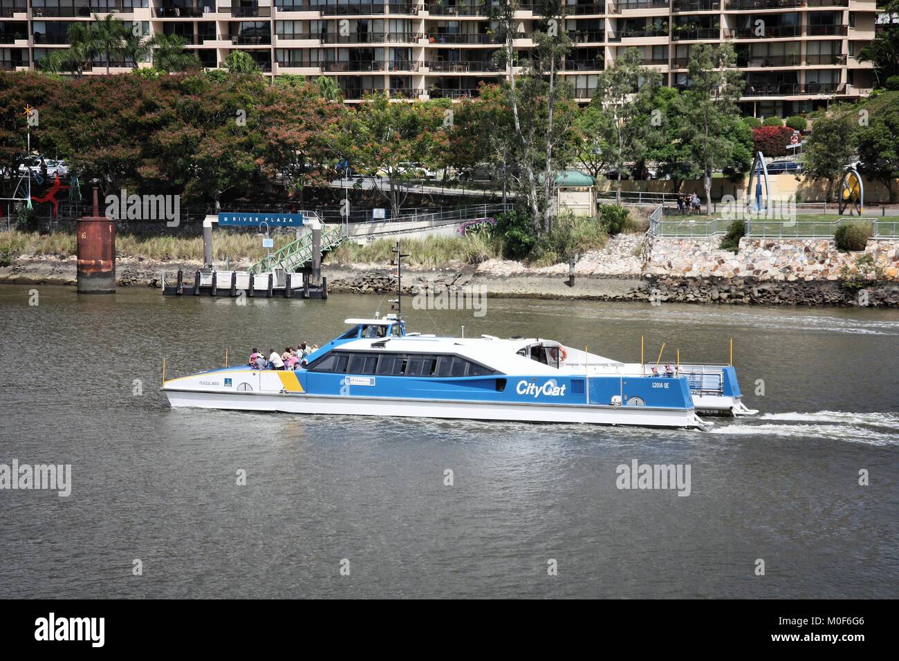 BRISBANE, AUSTRALIA - MARCH 20, 2008: People ride the CityCat catamaran, public ferry service in Brisbane. 21 CityCat vessels are operated by Transdev Stock Photo