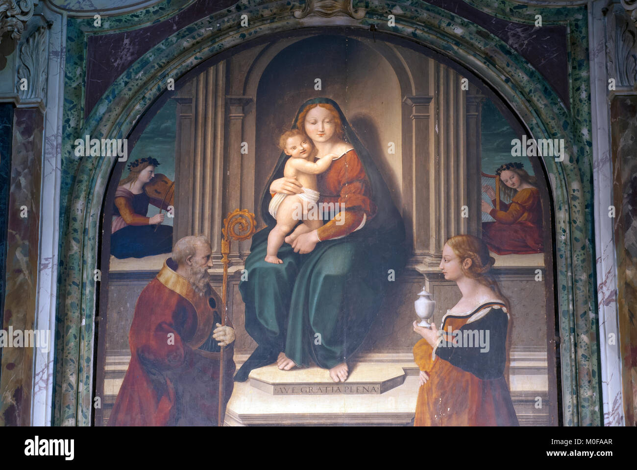 Detail of “La Vergine col Bambino, San Martino Vescovo, Santa Maria Maddalena e due Angeli”(1521) by Domenico Alfani, Città della Pieve, Umbria, Italy Stock Photo