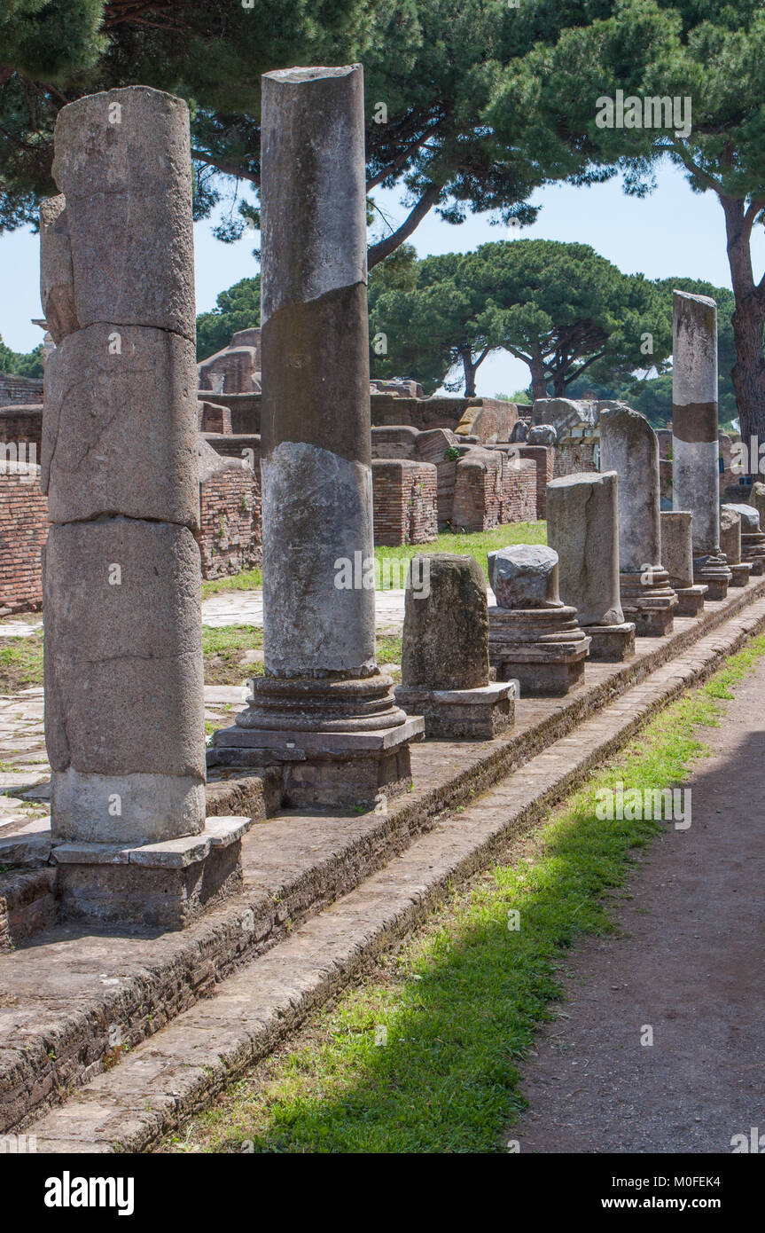 Ostia Antica, Italy - April 23, 2009 - Column ruins in the archeological site of the harbor city of ancient Rome, 15 miles southwest of Rome Stock Photo