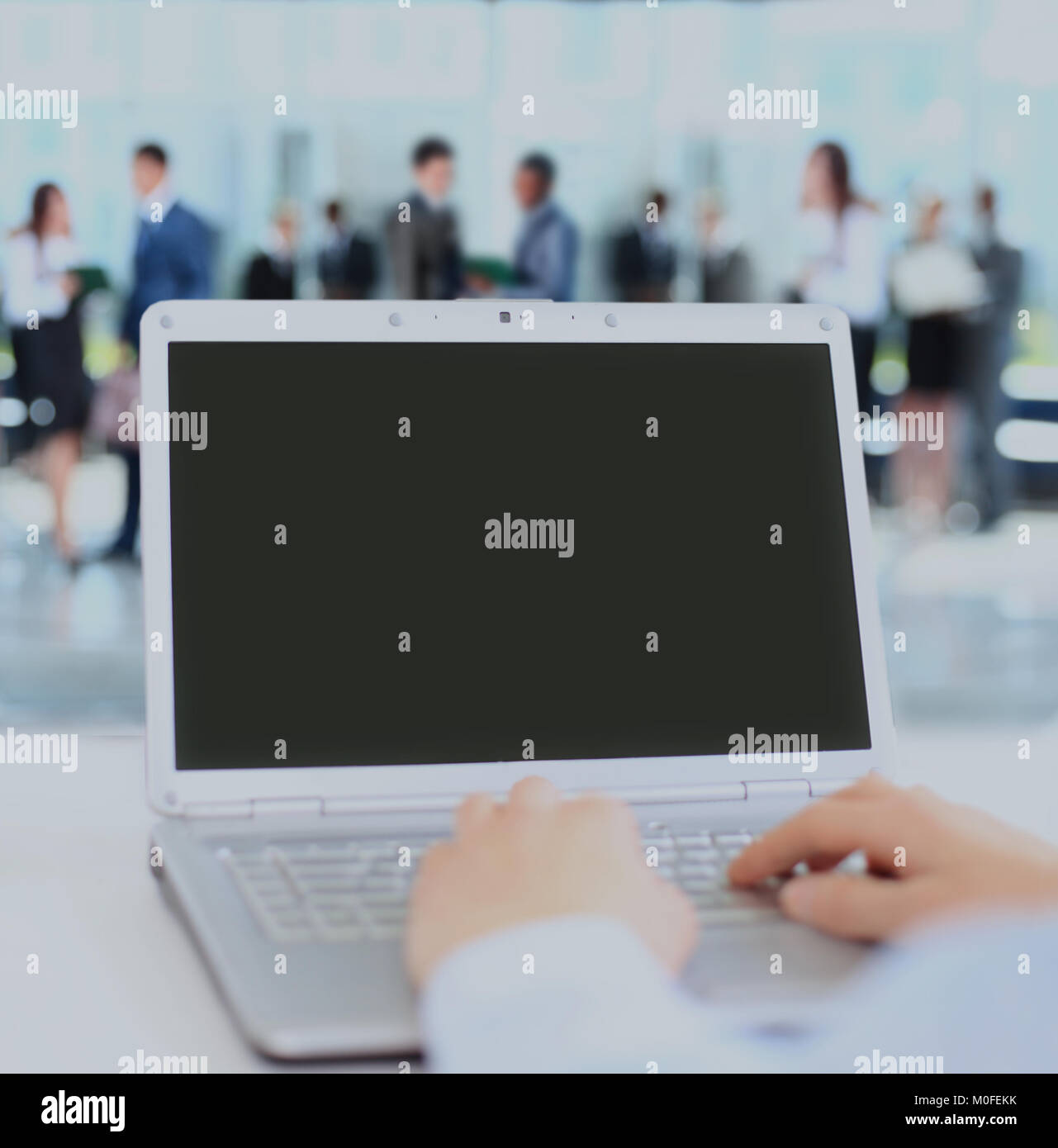 Person Typing on a modern laptop in an office Stock Photo - Alamy