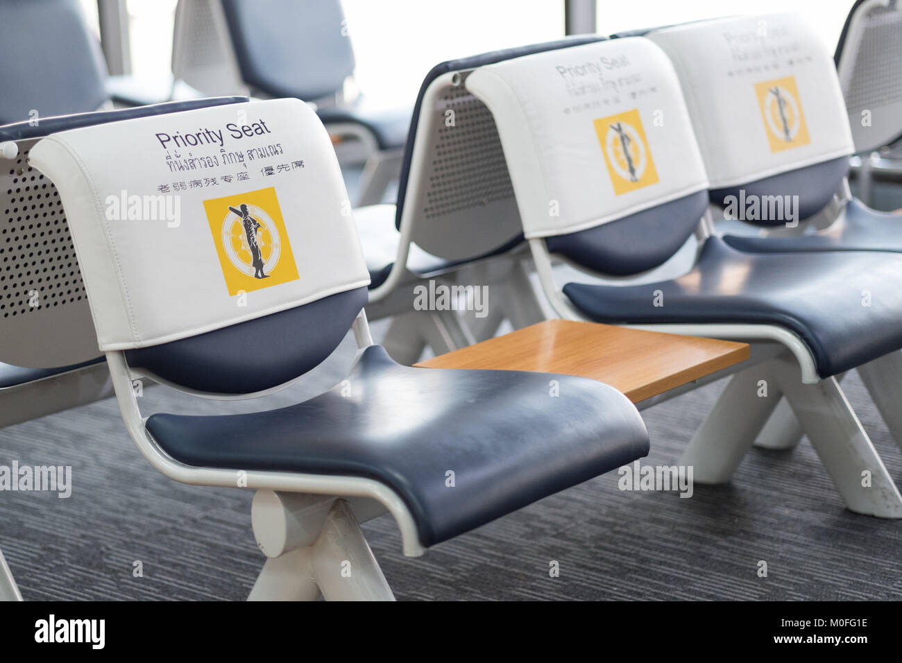 Empty seats at gate Priority Seating in airport Stock Photo Alamy