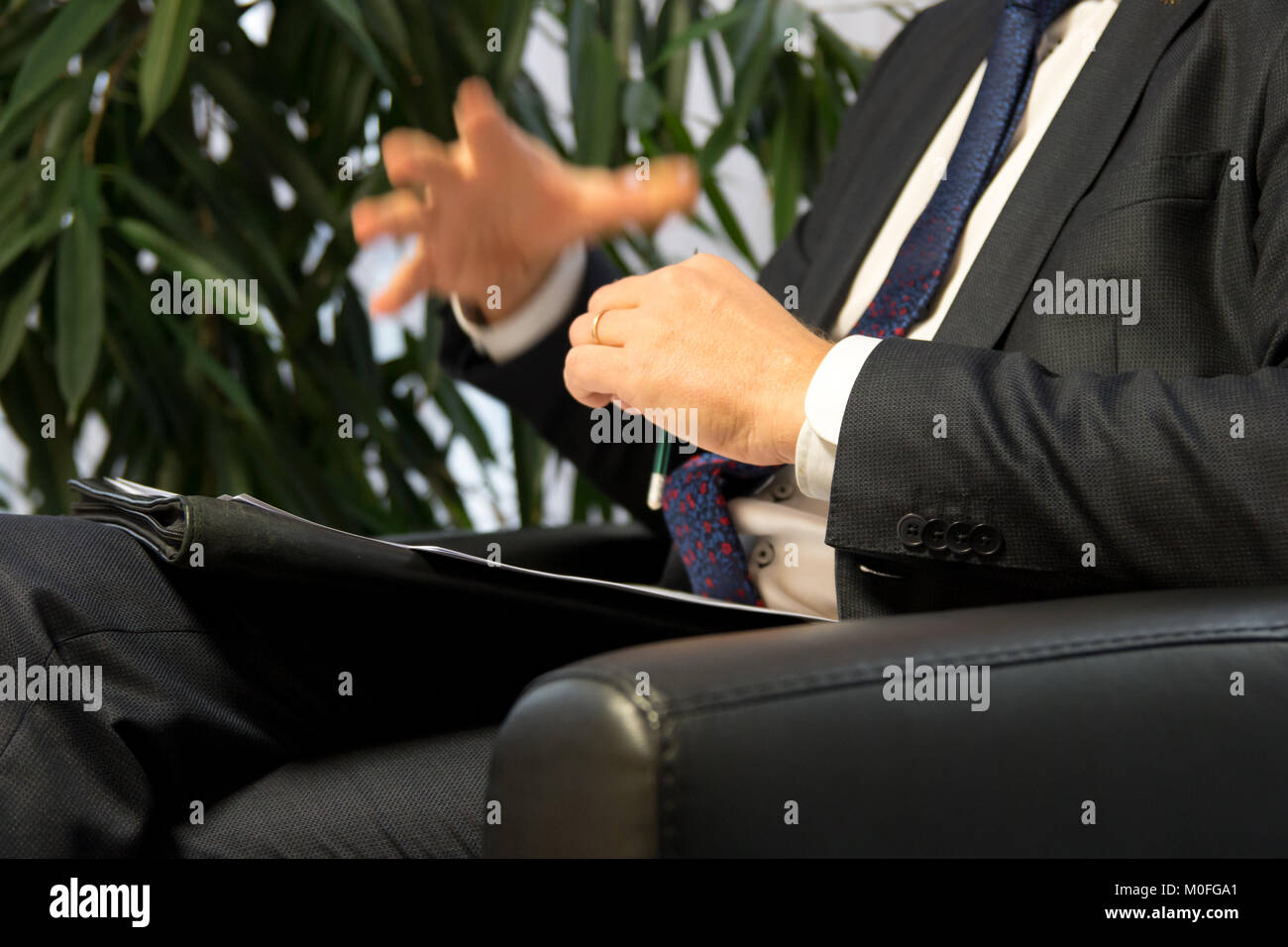 Businessman boss or politician giving interview. Stock Photo