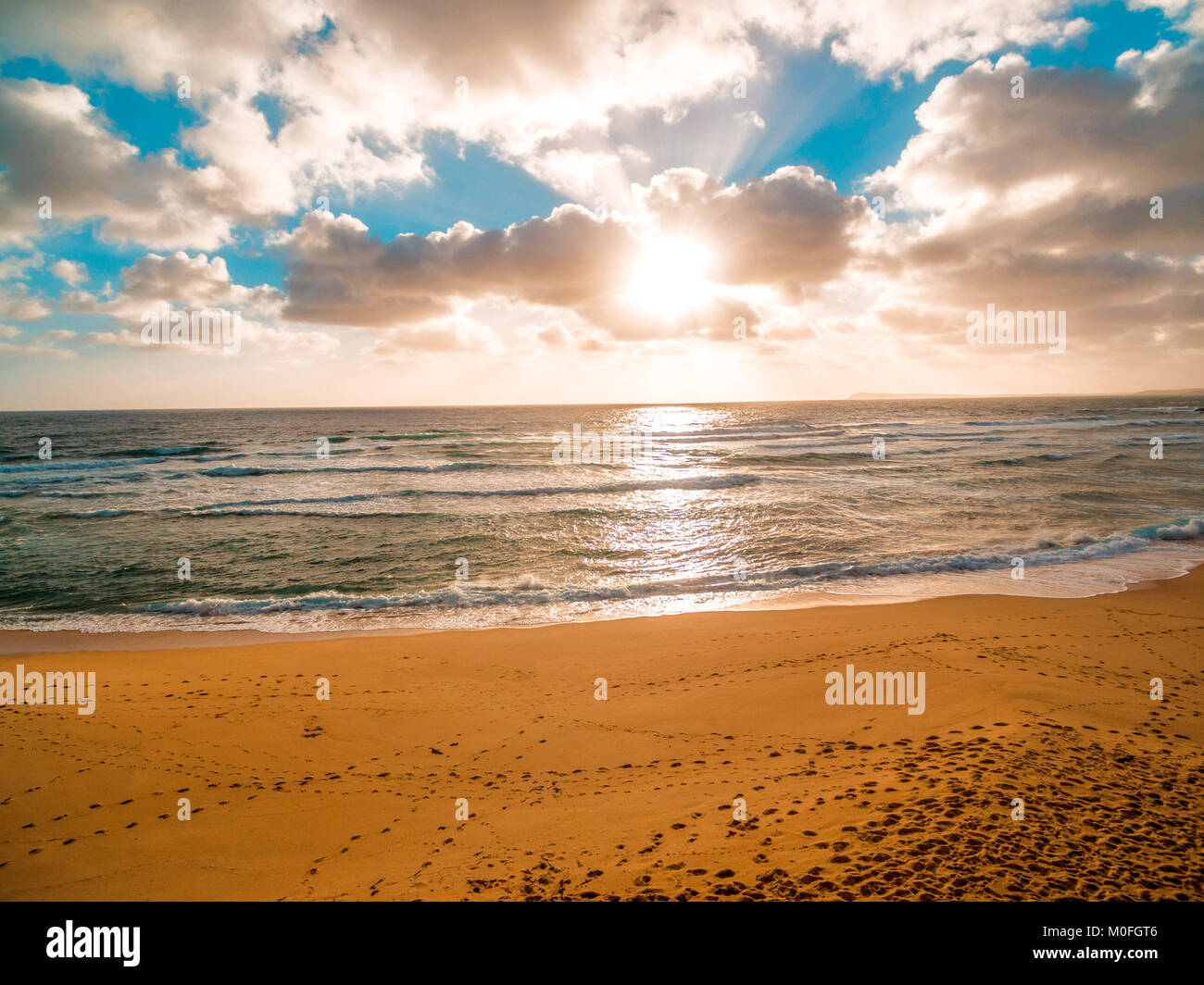 Aerial scenic view of glowing golden sunset over ocean Stock Photo - Alamy