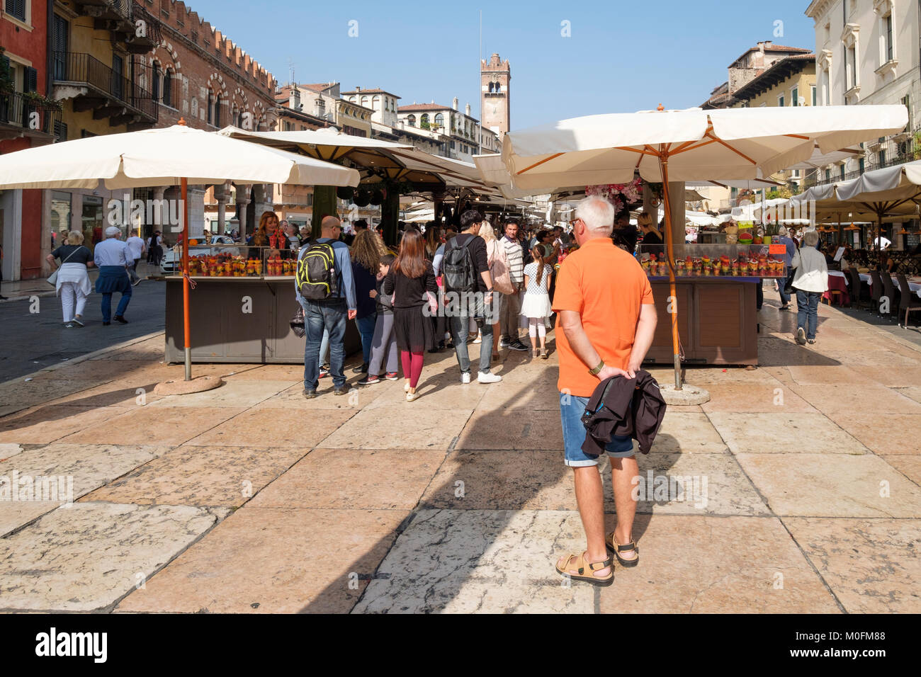 Shopping in the street market, Piazza delle Erbe, Verona, Veneto, Italy Stock Photo