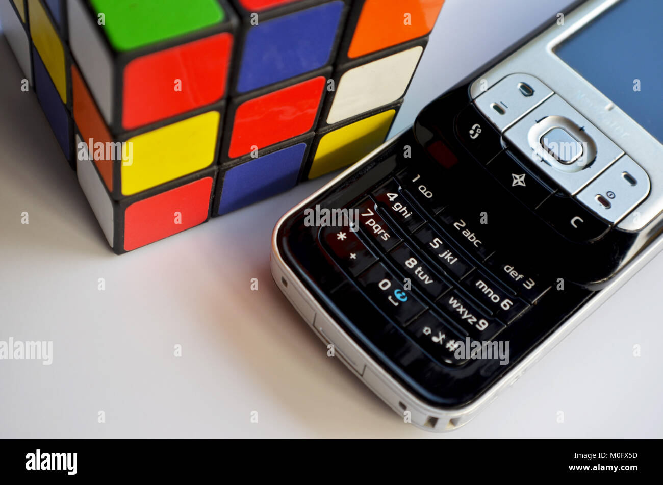 Rubiks cube and Nokia navigator phone Stock Photo