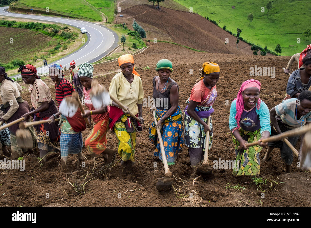 Rwanda, surrounding of Kibuye, peasants at work Stock Photo