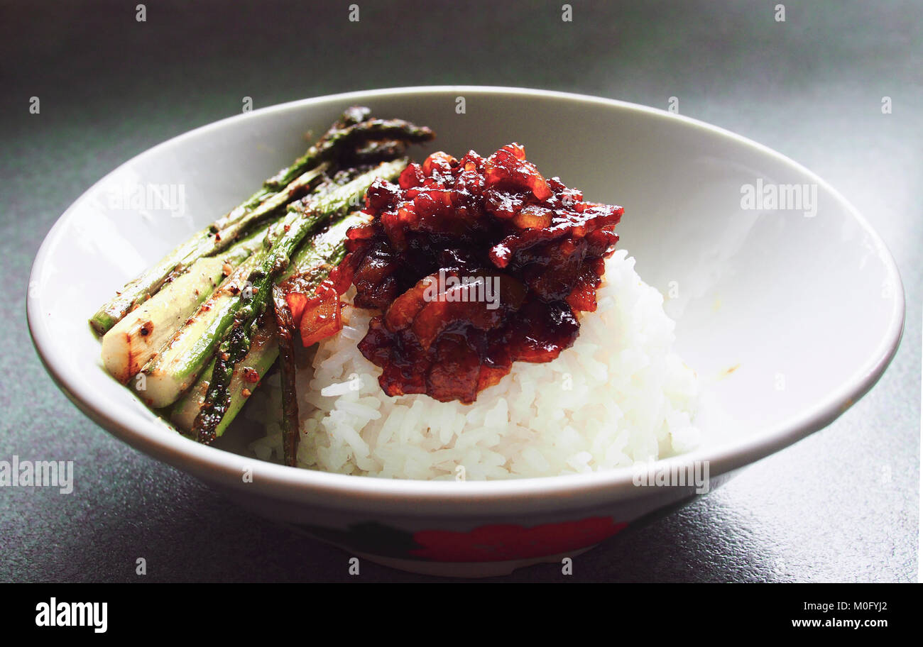 Taiwanese braised pork on rice and vegetable Stock Photo - Alamy