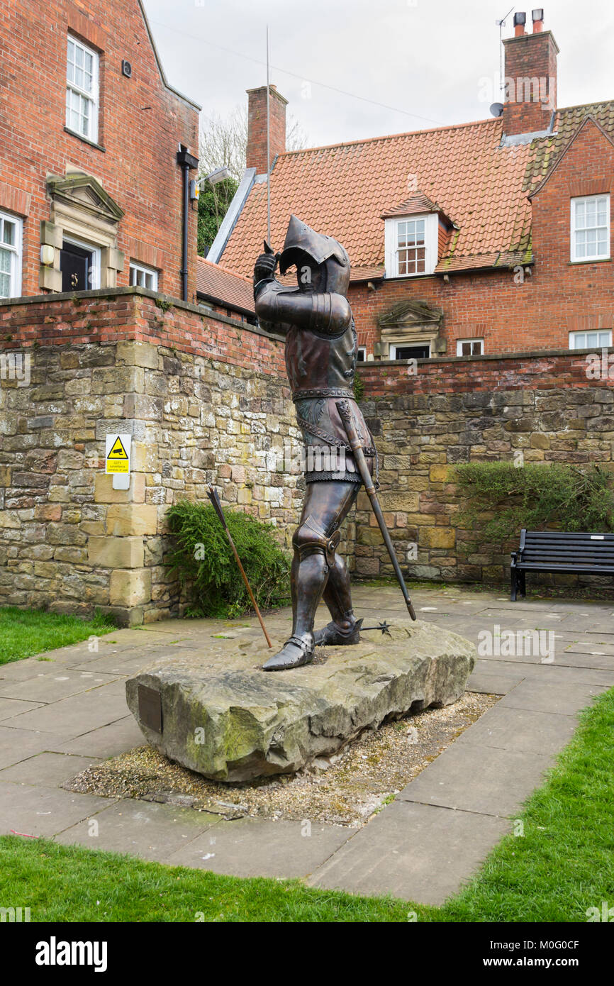 Bronze statue of Sir Henry Percy (1634-1403) aka Harry Hotspur, sited on Pottergate, Alnwick, Northumberland.  Statue by sculptor Keith Maddison. Stock Photo