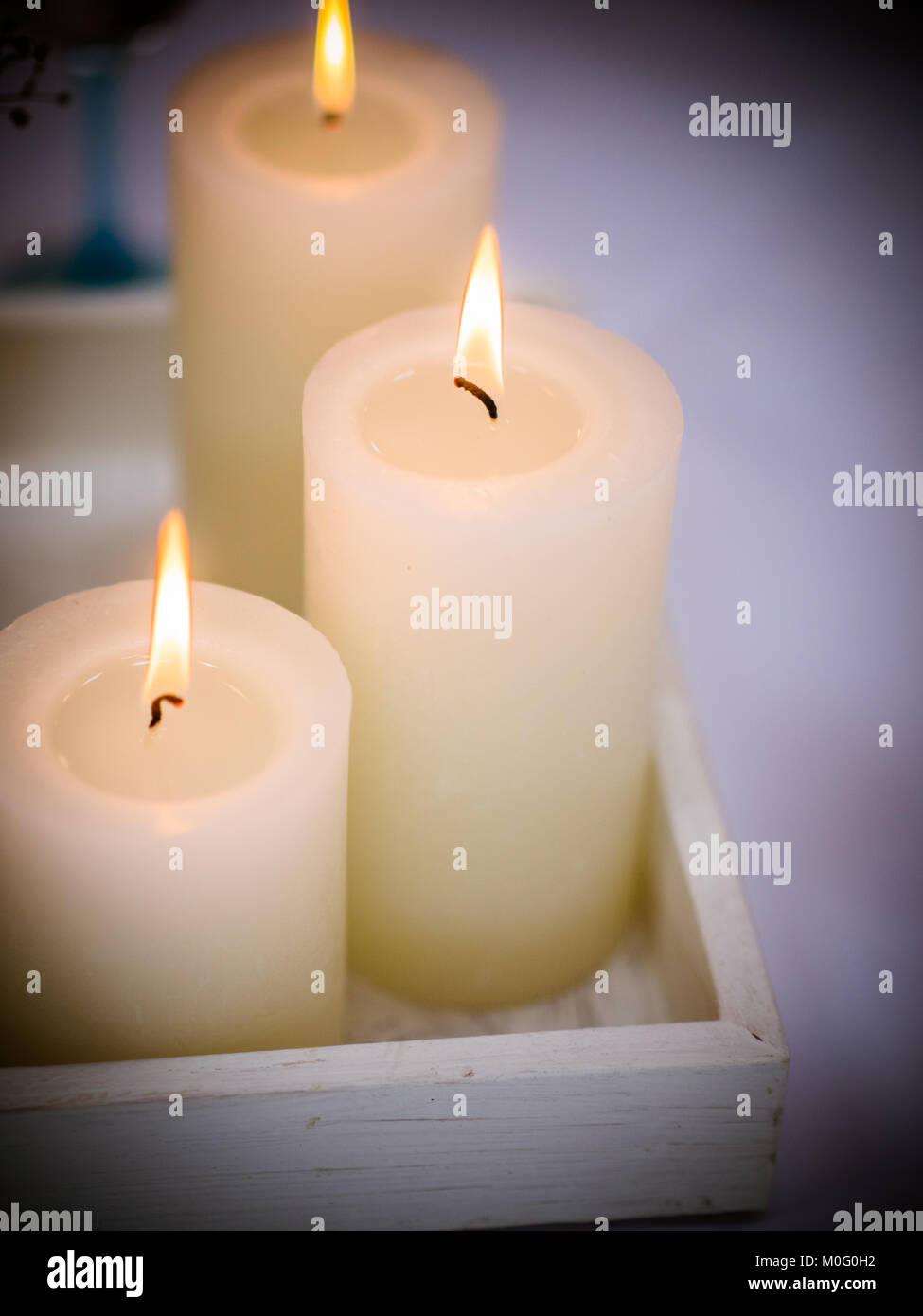 Burning candles set. Aromatic decorative round cylindrical candle