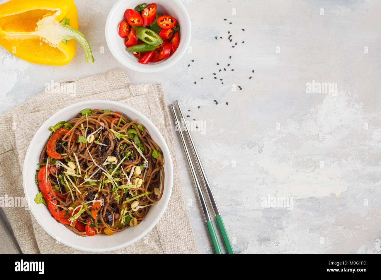 Healthy vegan buckwheat noodles with a mix of vegetables, sprouts and