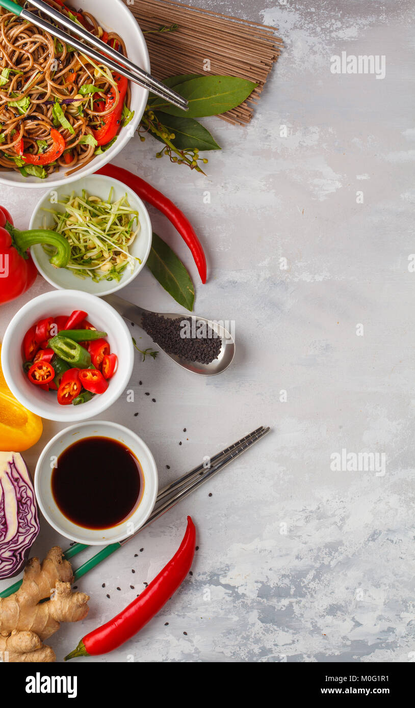 Healthy vegan buckwheat noodles with a mix of vegetables, sprouts and