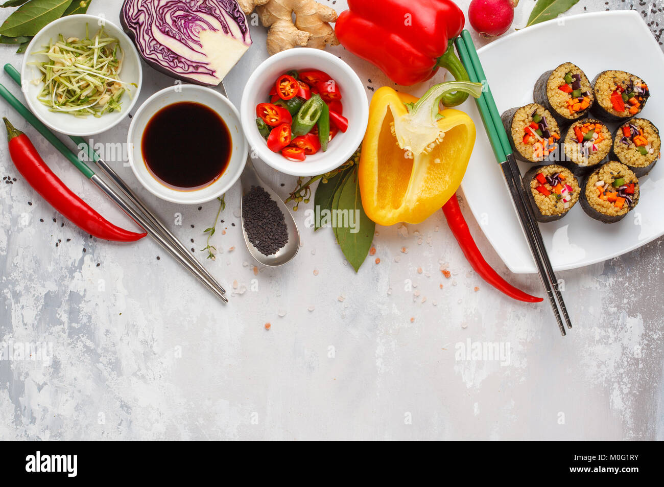 Vegan food background. Sushi rolls with quinoa, vegetables and sprouts