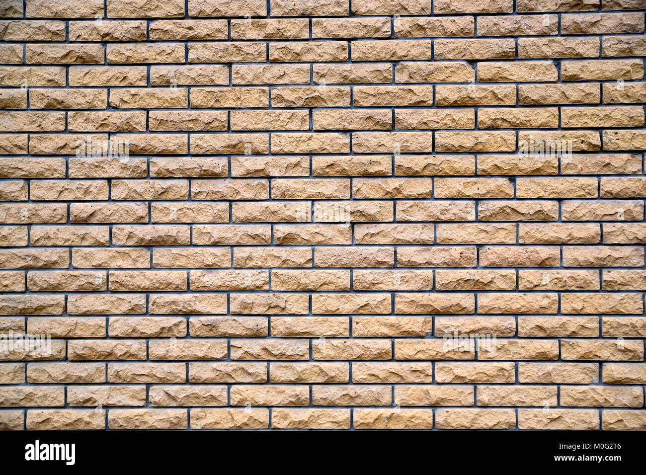 View of High resolution texture of part of grey beige brick wall Stock Photo ...