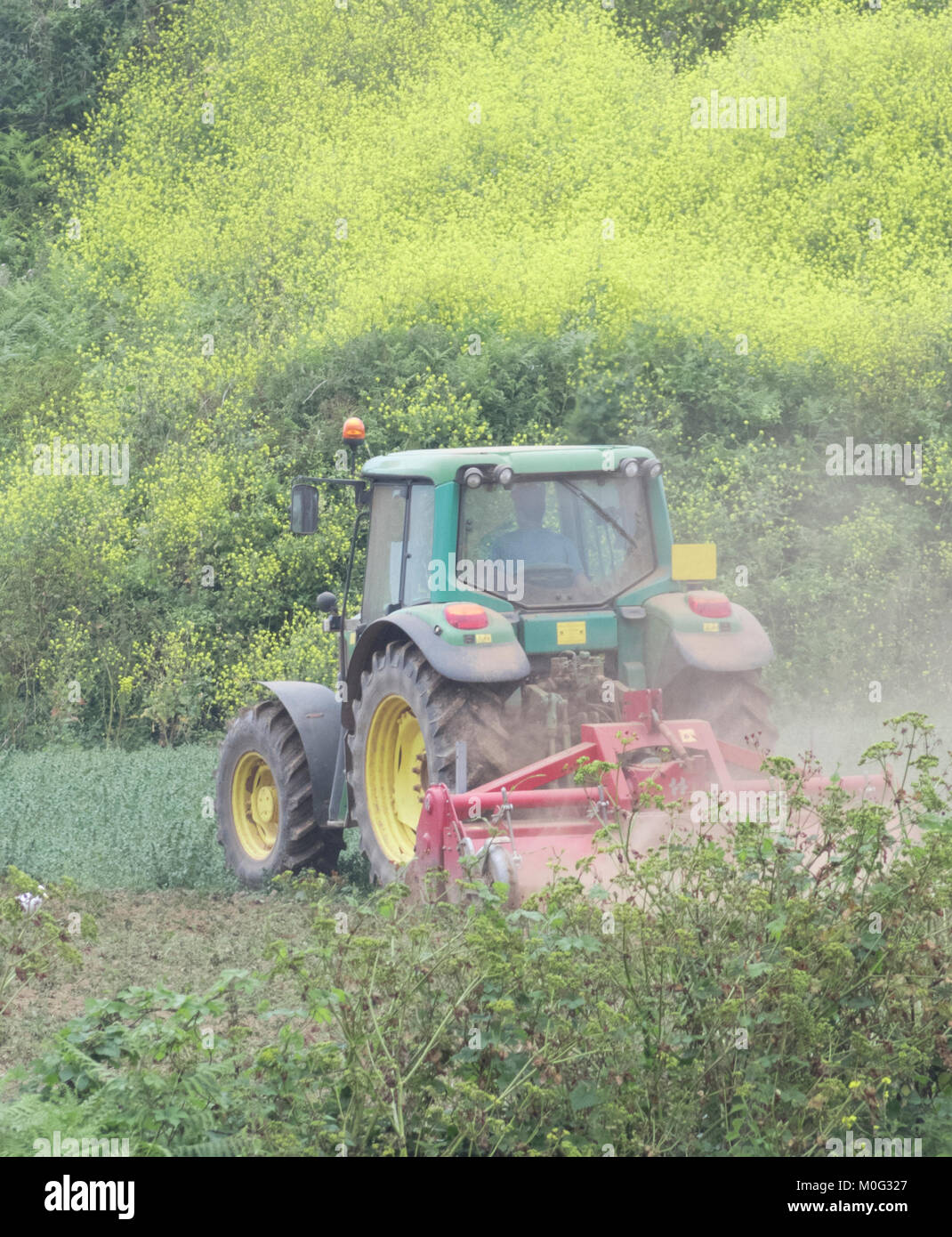 John deere tractor ploughing field hi-res stock photography and images ...