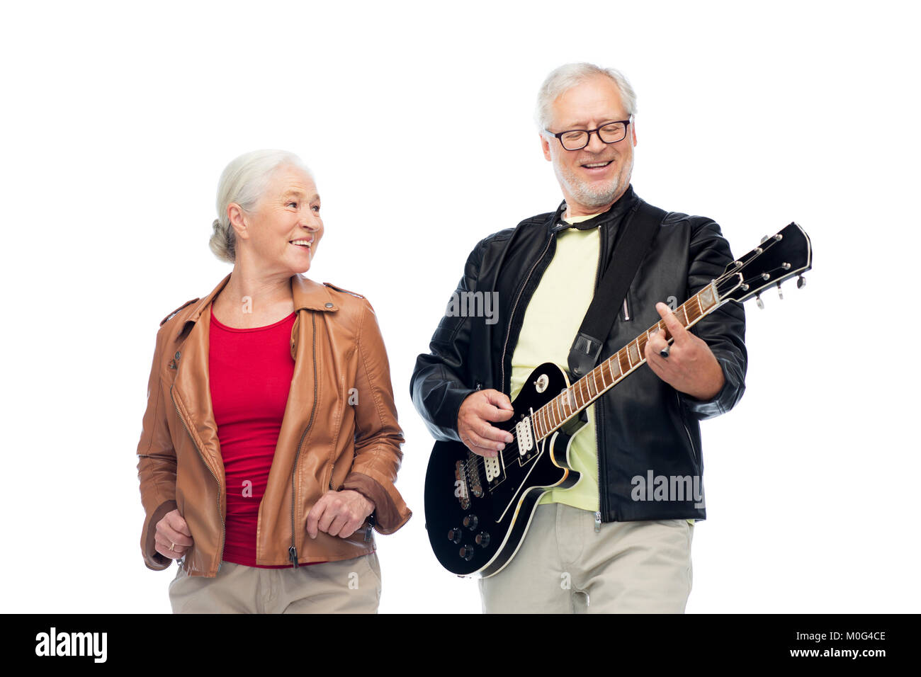 happy senior couple with electric guitar Stock Photo