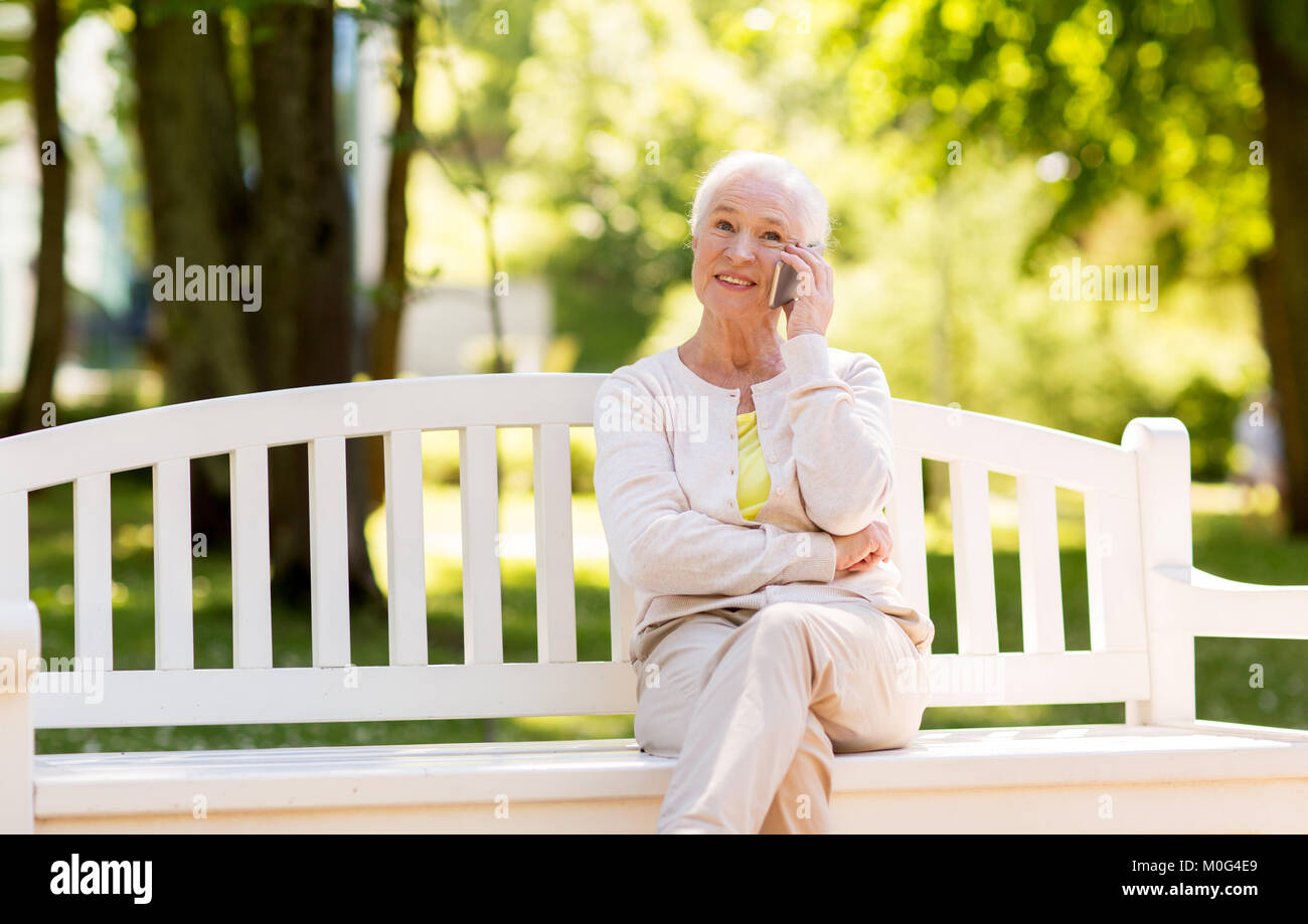 Happy mature woman calling hi-res stock photography and images - Alamy