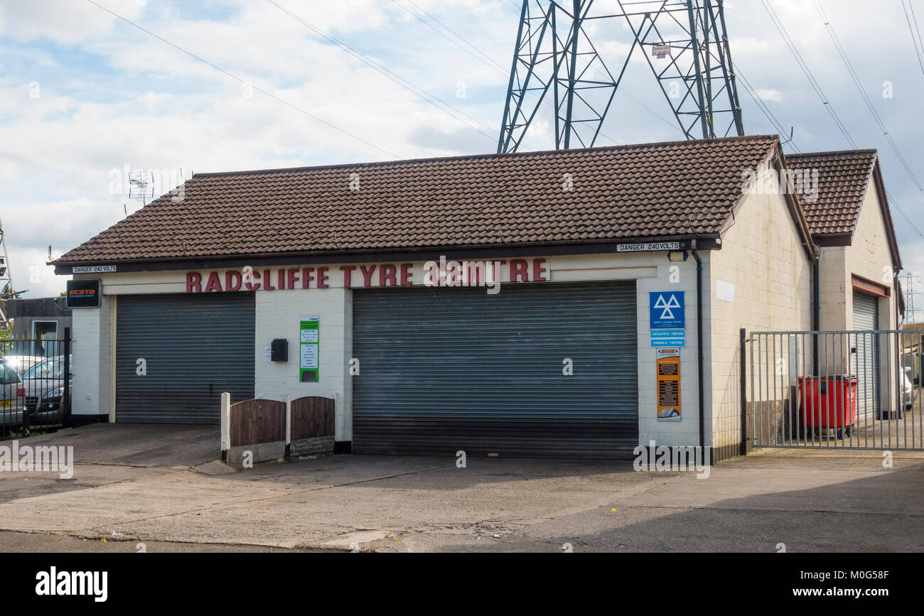 Radcliffe Tyre and MOT Centre on Radcliffe Moor Road in Radcliffe, Manchester. Used as a location in Peters Kays series Max & Paddys Road to Nowhere Stock Photo