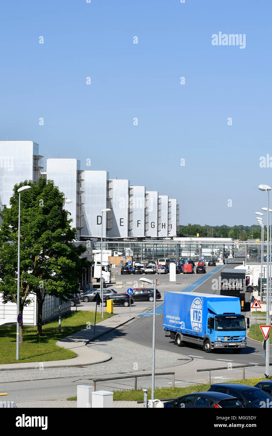 Freight halls with truck freight traffic, cargo modules A - I, transport, A, B, C, D, E, F, G, H, I, J,Cargo, freight, truck, road, Munich Airport Stock Photo
