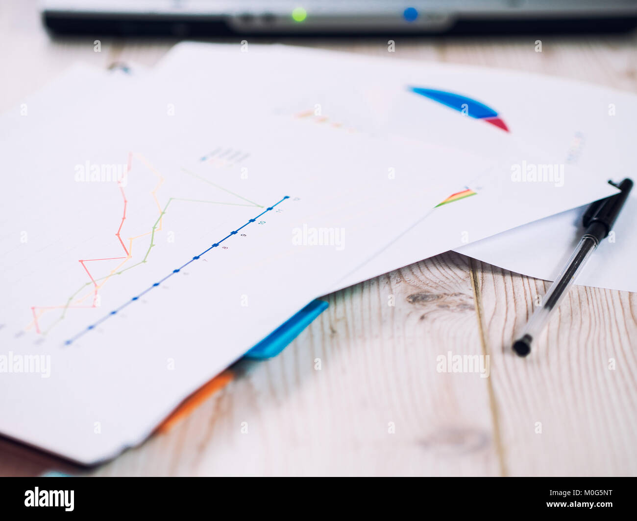 business analysis graphics on table Stock Photo - Alamy