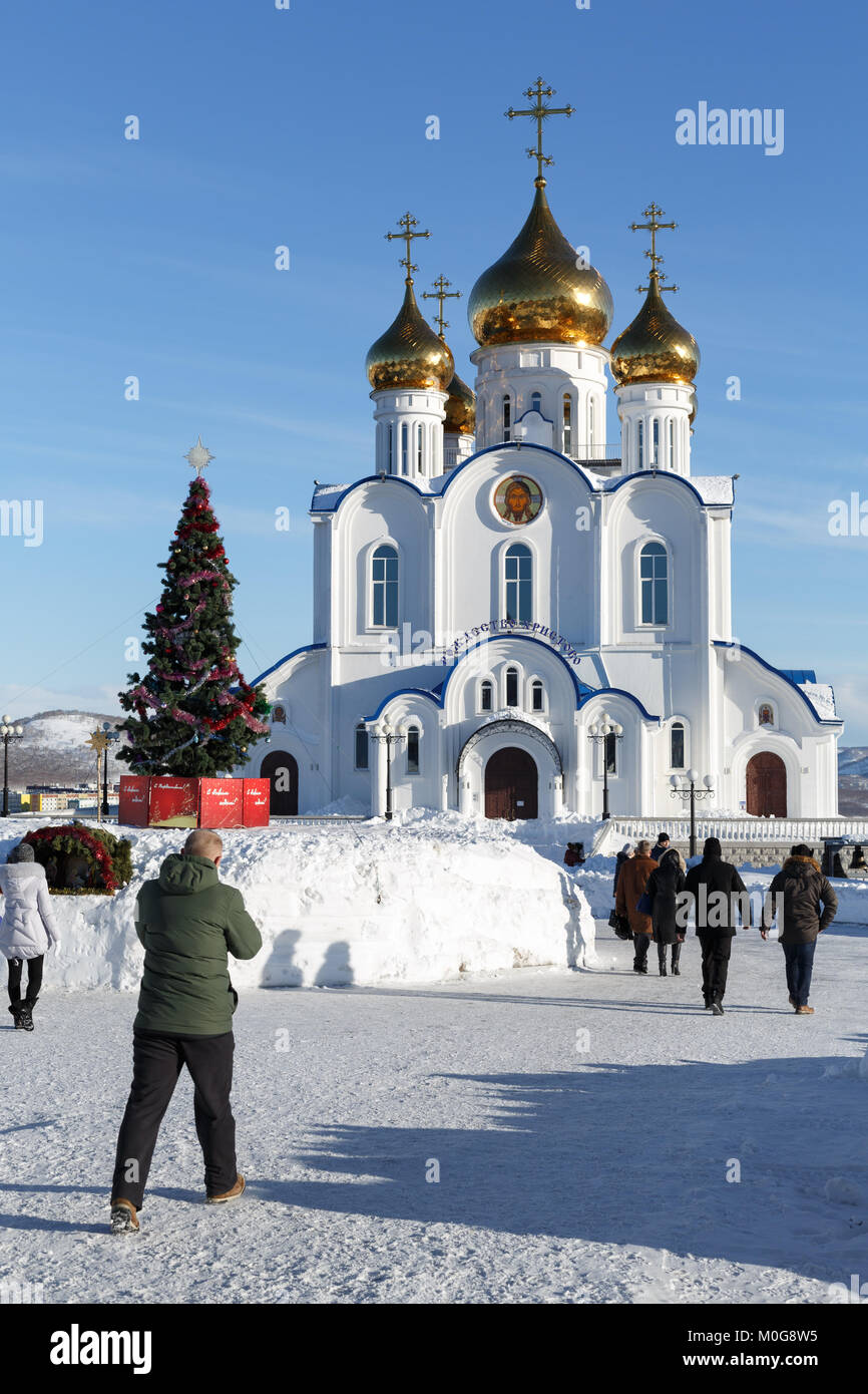 Parishioners on Christmas Eve walk to Holy Trinity Orthodox Cathedral