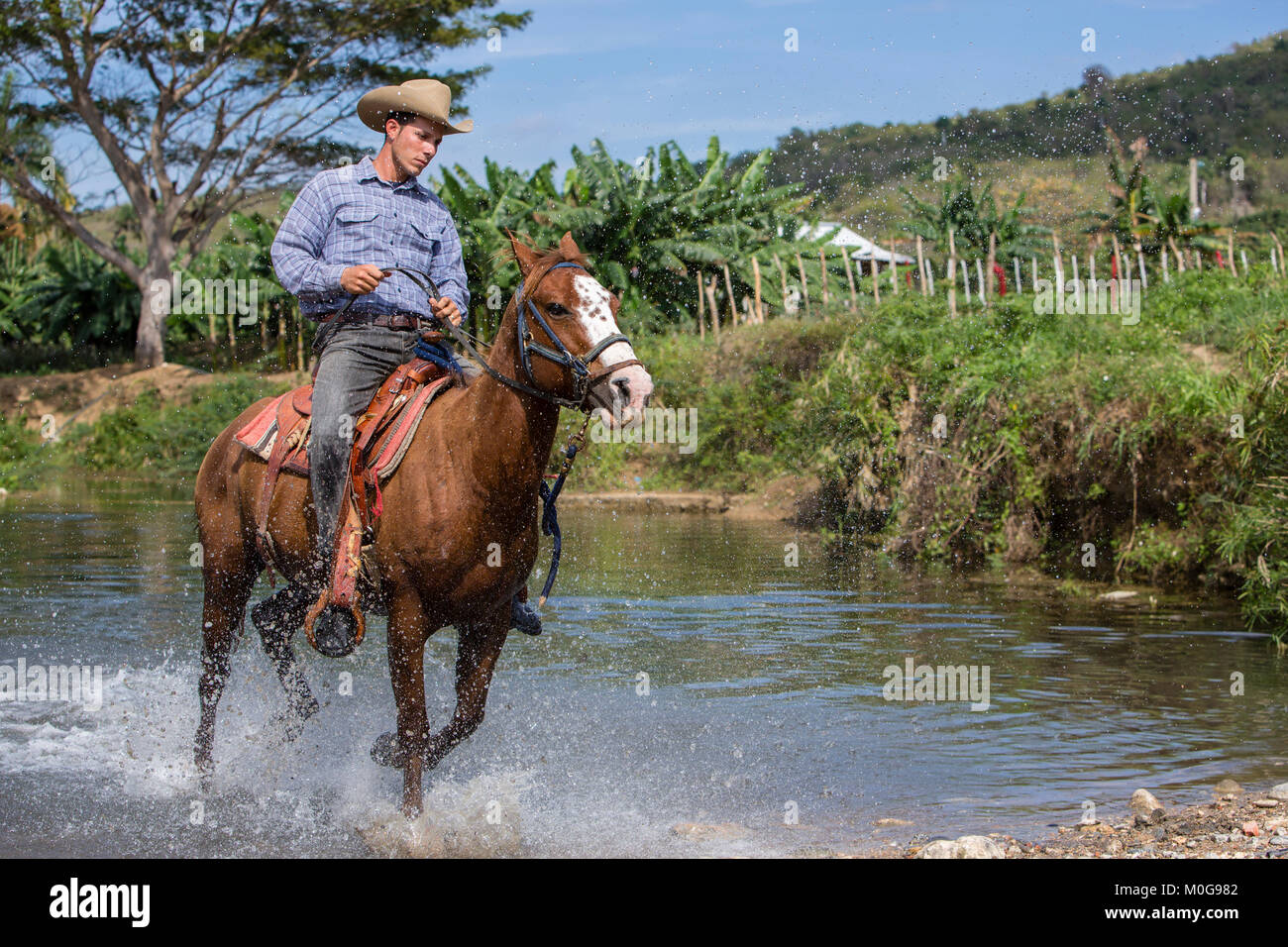 Cowboy on horseback in Trinidad, Cuba Stock Photo