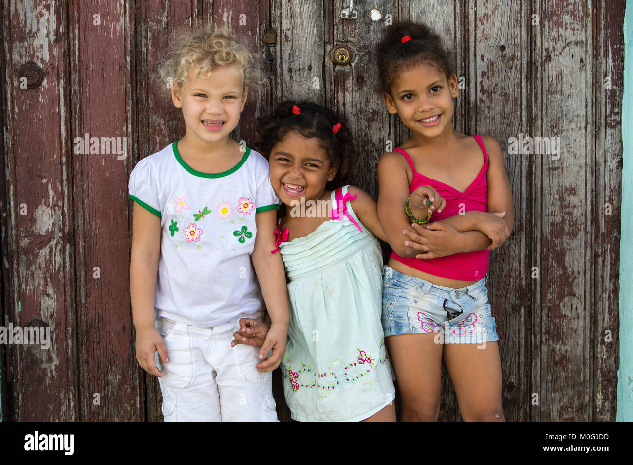 Young girls posing in Regla, Cuba Stock Photo
