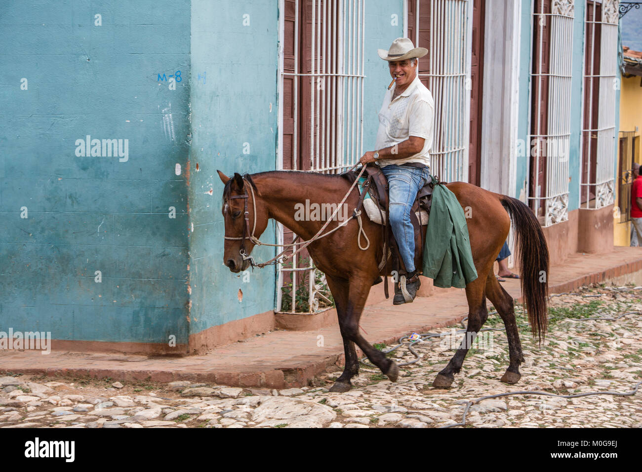 Cowboy on horseback in Trinidad, Cuba Stock Photo