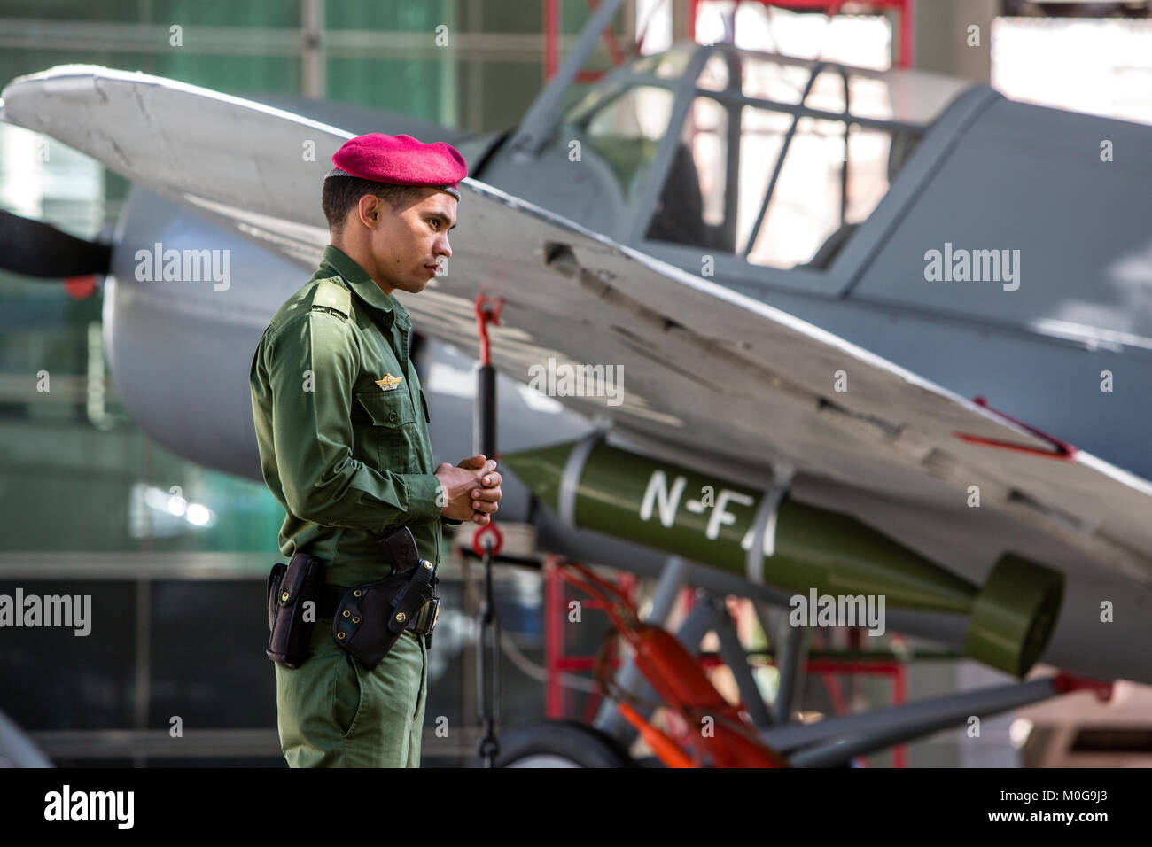 Guard in front of Cuban bomber plane at the Memorial Granma in Havana, Cuba Stock Photo