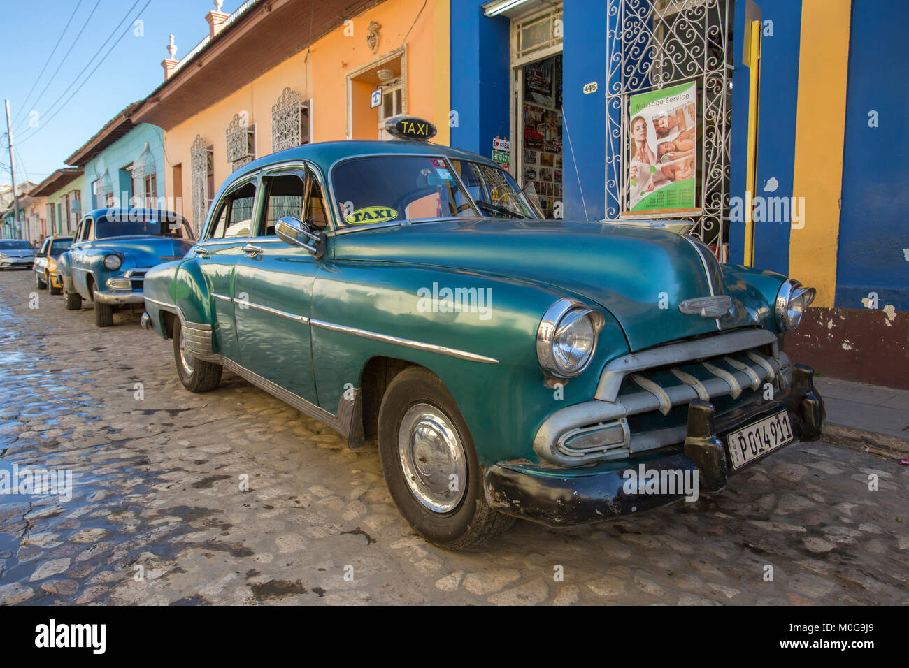 Classic American cars in Trinidad, Cuba Stock Photo