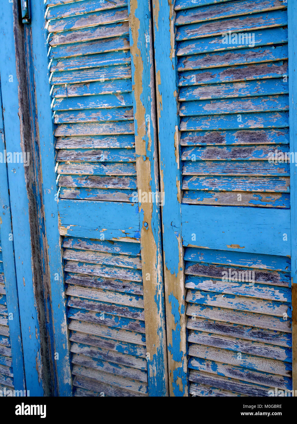 Peeling blue paint of changing room doors at Almyros Beach,Corfu, Greece Stock Photo