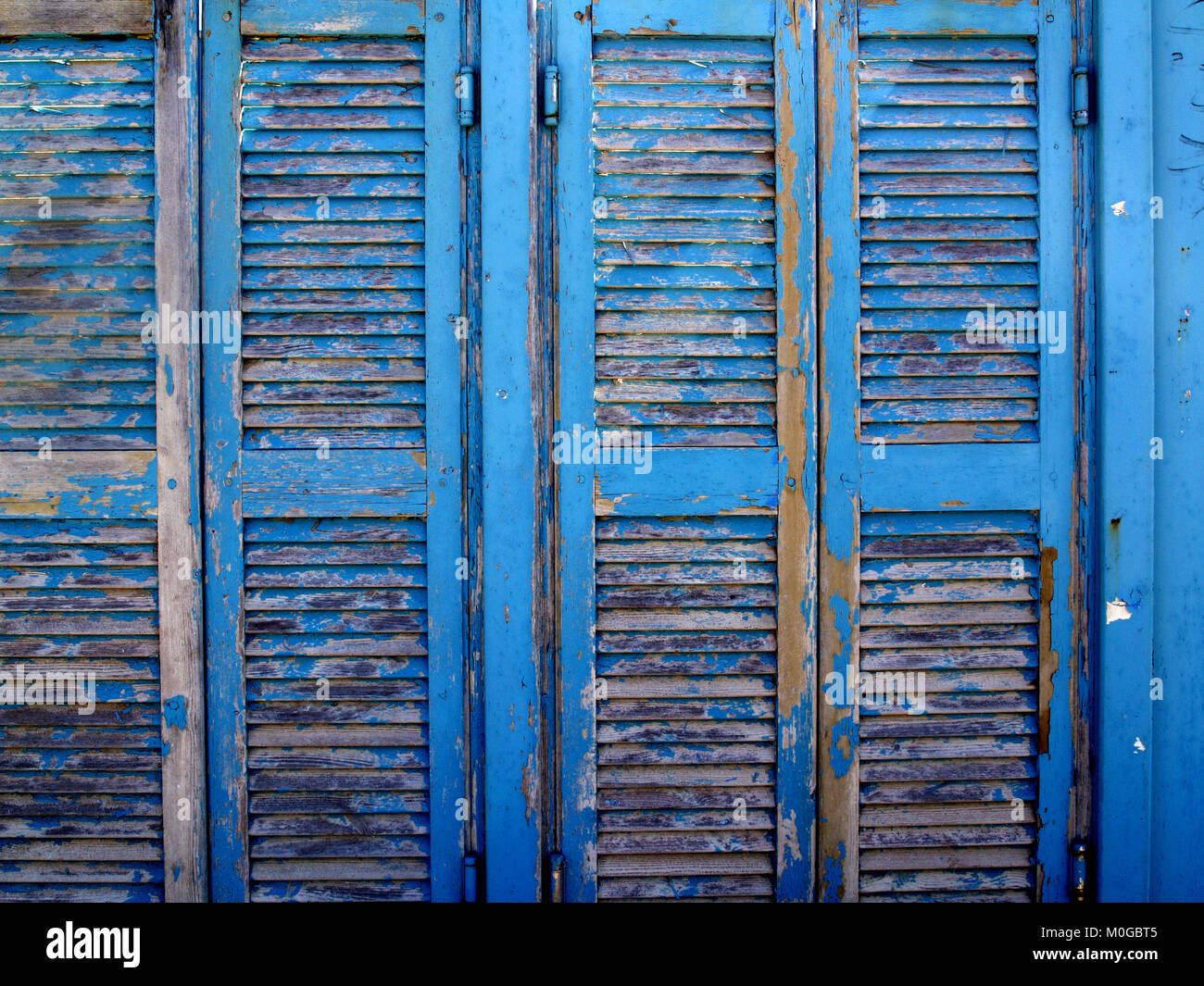 Peeling blue paint of changing room doors at Almyros Beach,Corfu, Greece Stock Photo