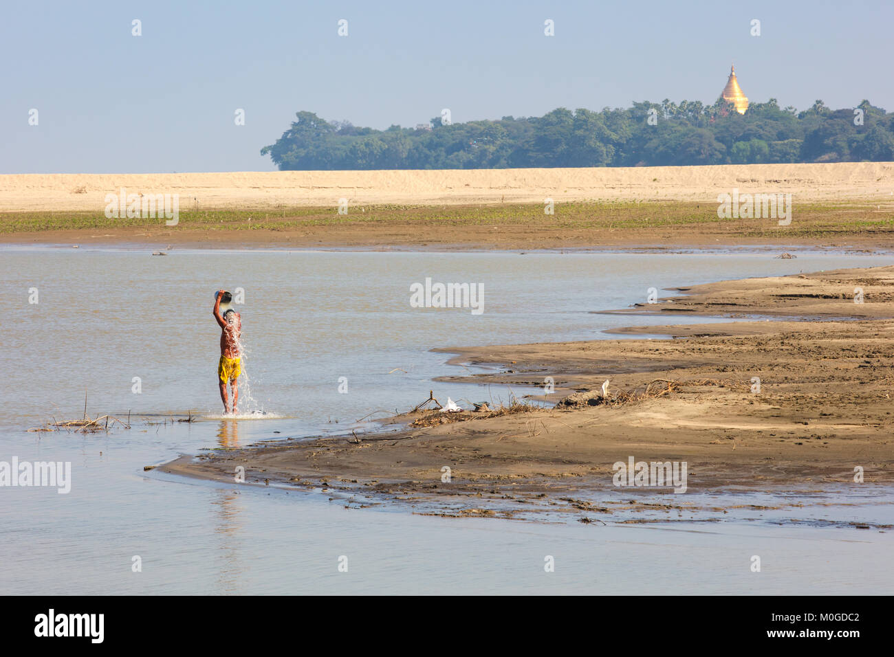Fresh shower on the Irrawaddy river. Old Bagan, Myanmar (Burma). Stock Photo