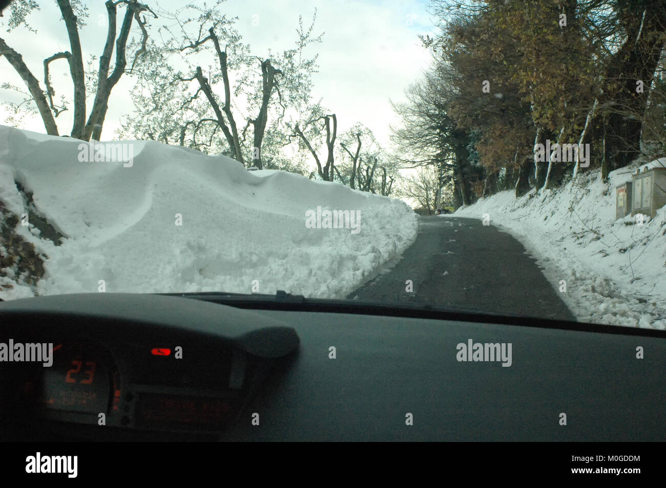 Driving a car after a snow storm Stock Photo - Alamy