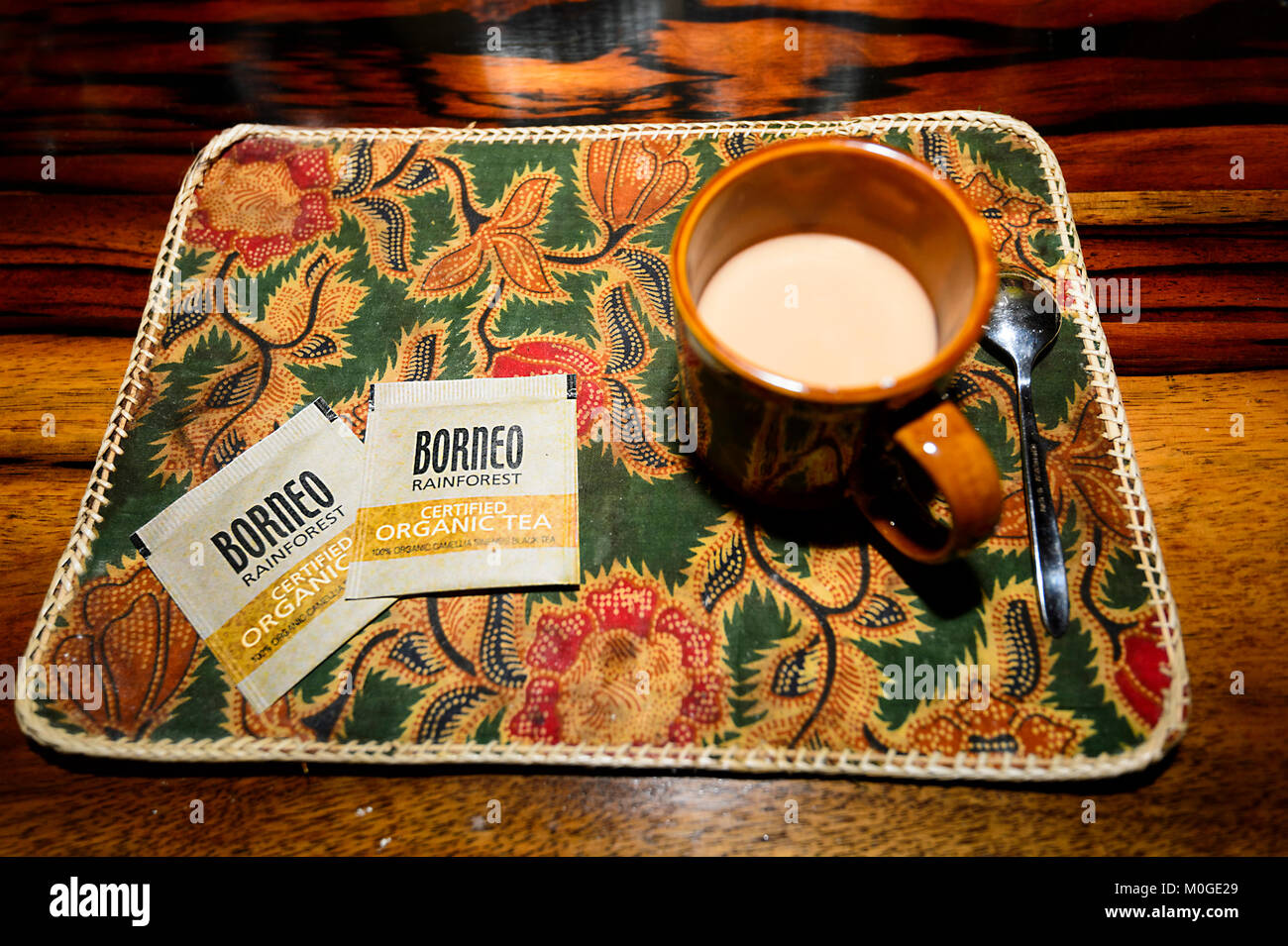 A tray with a cup of Borneo organic tea Stock Photo