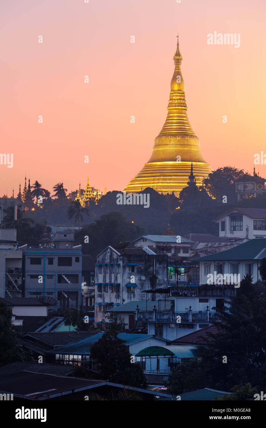 The golden stupa of the 'Shwedagon Pagoda' at twilight. Yangon (Rangoon), Myanmar (Burma). Stock Photo