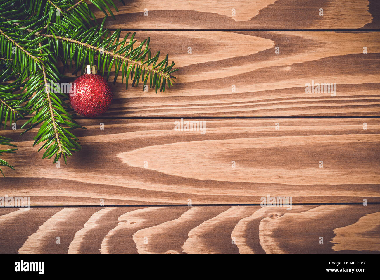 Christmas background with tree and red ball Stock Photo - Alamy