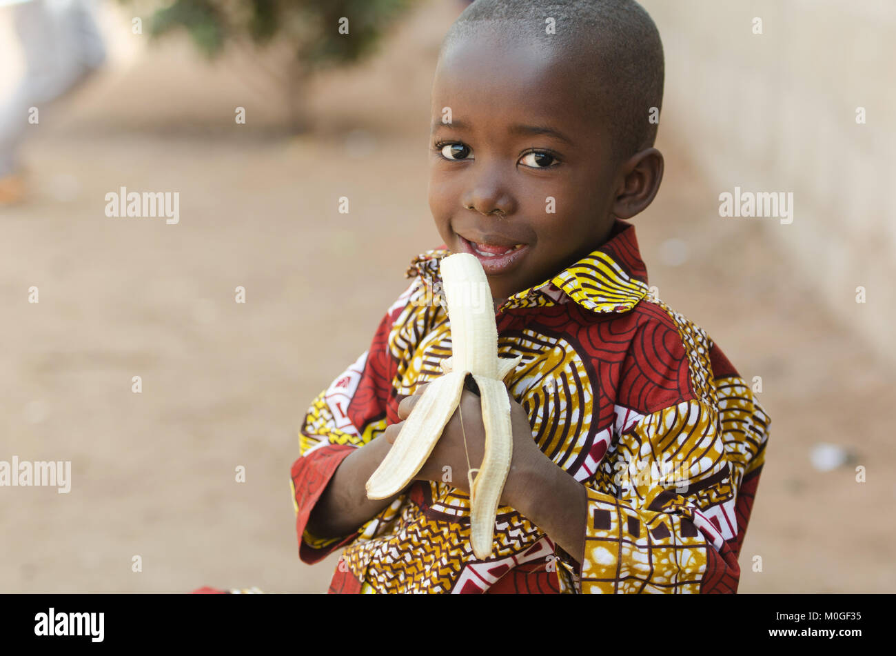 happy african kid eating