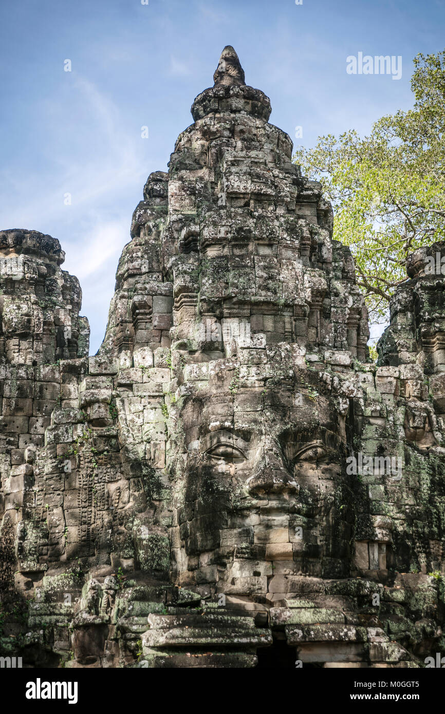 Faces on tower, Victory Gate, Bayon Temple, Angkor Thom, Cambodia. Stock Photo