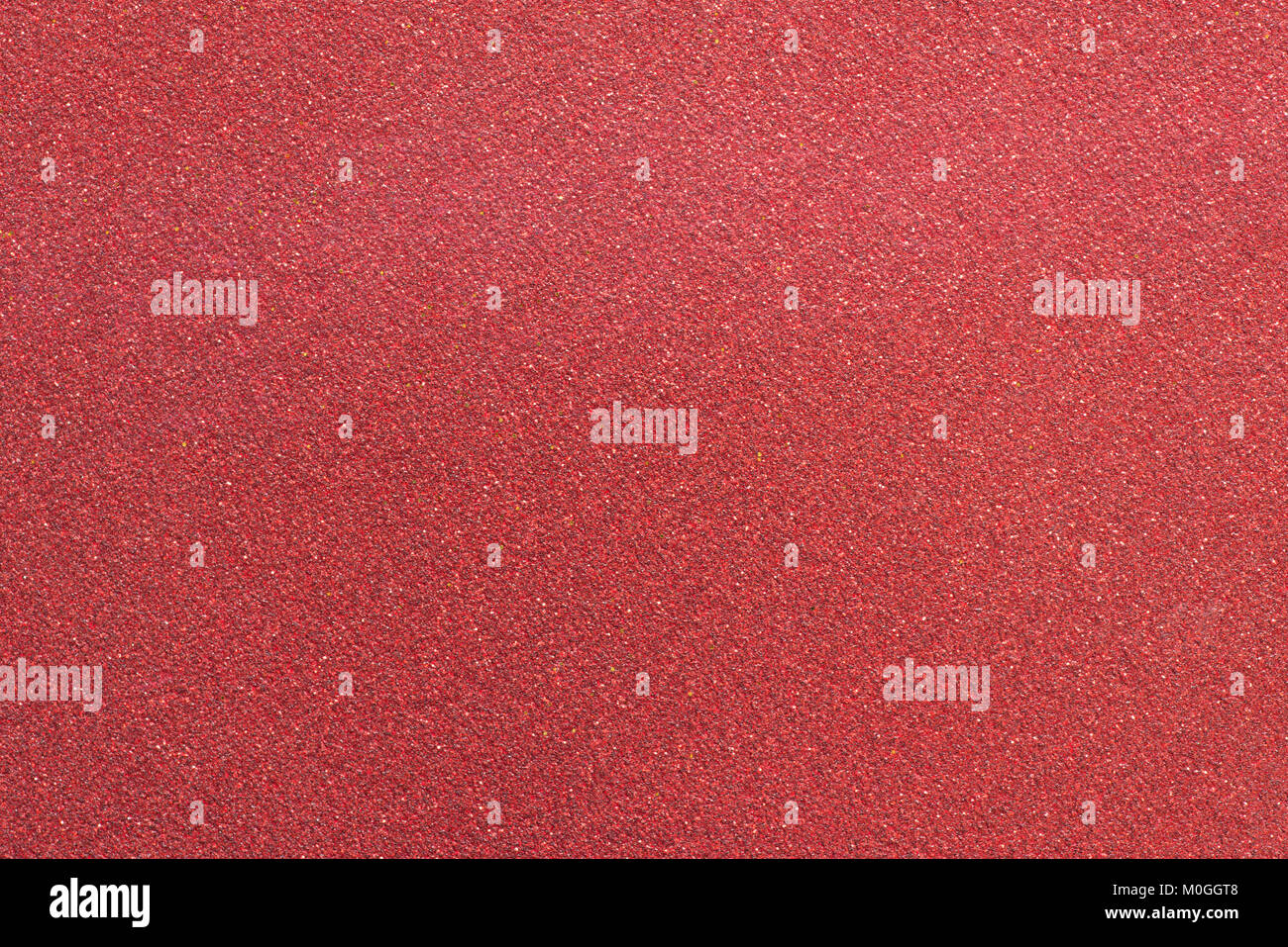 red color grainy paper background texture Stock Photo