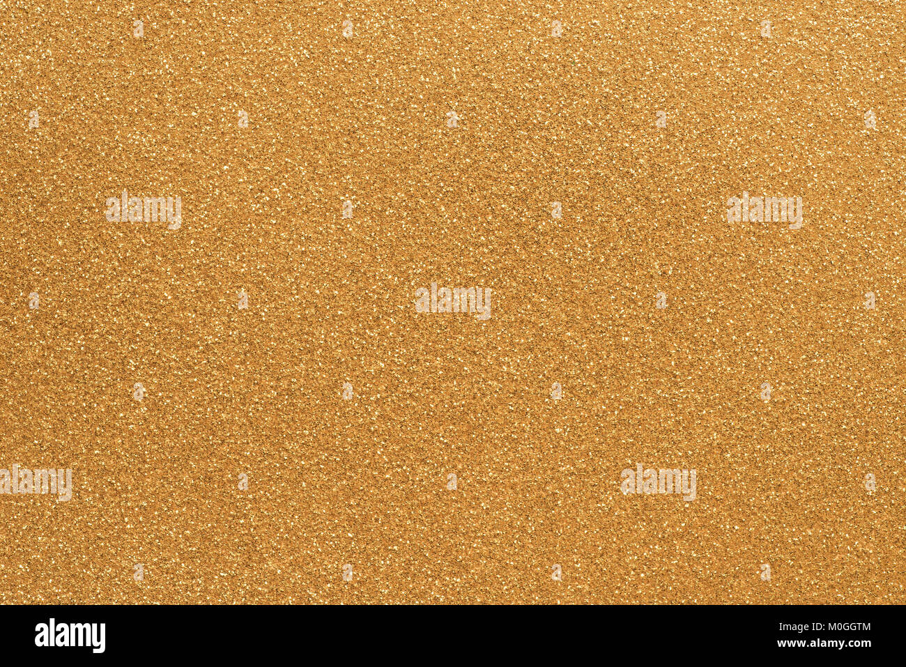 gold color grainy paper background texture Stock Photo