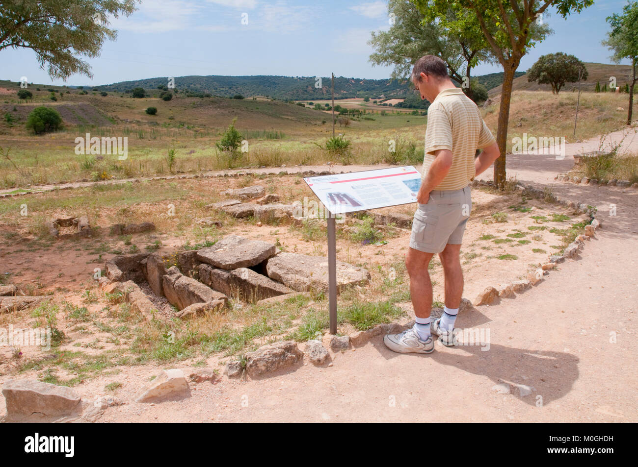 Man at the necropolis. Segobriga Archaeological Park, Cuenca province, Castilla La Mancha, Spain. Stock Photo