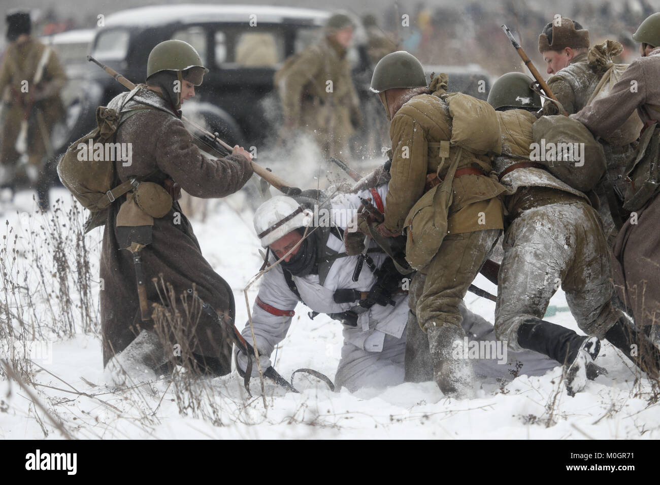 January 21, 2018 - Saint-Petersburg, Russia - Members of historical military clubs wearing Soviet and Nazi army uniforms take a part in the World War II battle reconstruction marking the 75th anniversary of the battle that broke the Siege of Leningrad (now Saint-Petersburg) about 30 kilometers east of the city. Credit: Elena Ignatyeva/ZUMA Wire/Alamy Live News Stock Photo