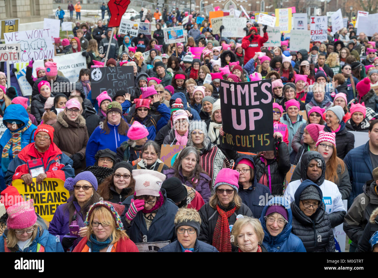 Lansing, Michigan USA - 21 January 2018 - On the first anniversary of the Women's March in Washington which protested the inauguration of President Donald Trump, women marched in cities across the country encouraging women to vote for alternatives in the 2018 mid-term elections. About 5,000 rallied at the Michigan state capitol. Credit: Jim West/Alamy Live News Stock Photo
