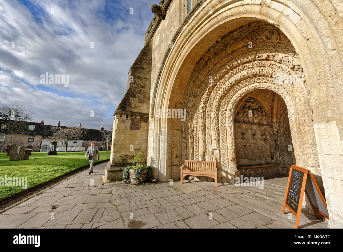 Malmesbury, UK. 22nd Jan, 2018. UK Weather. The Norman porch at Malmesbury Abbey, widely regarded as one of the finest examples of its kind in western Europe, is bathed in sunshine after a weekend of cold and wet weather in Wiltshire. Credit: Terry Mathews/Alamy Live News Stock Photo