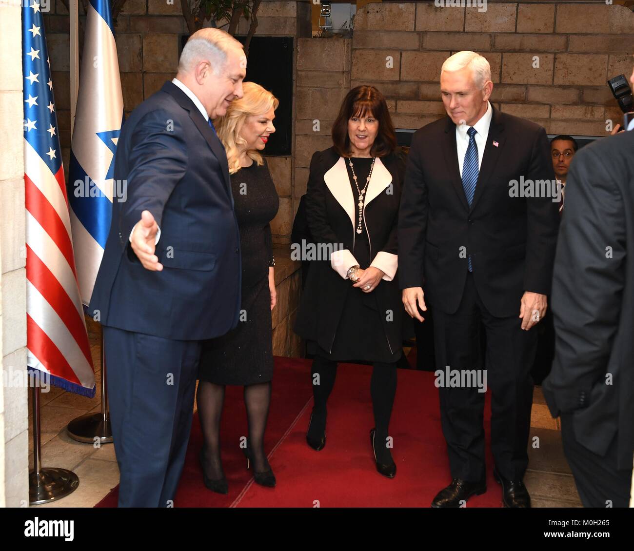 Jerusalem, Israel. 22nd Jan, 2018. U.S. Vice President Mike Pence, right, and wife Karen Pence, center, are welcomed by Israeli Prime Minister Benjamin Netanyahu, left, and his wife Sara Netanyahu before dinner at the Prime Minister's Residence January 22, 2018 in Jerusalem, Israel. Credit: Planetpix/Alamy Live News Stock Photo