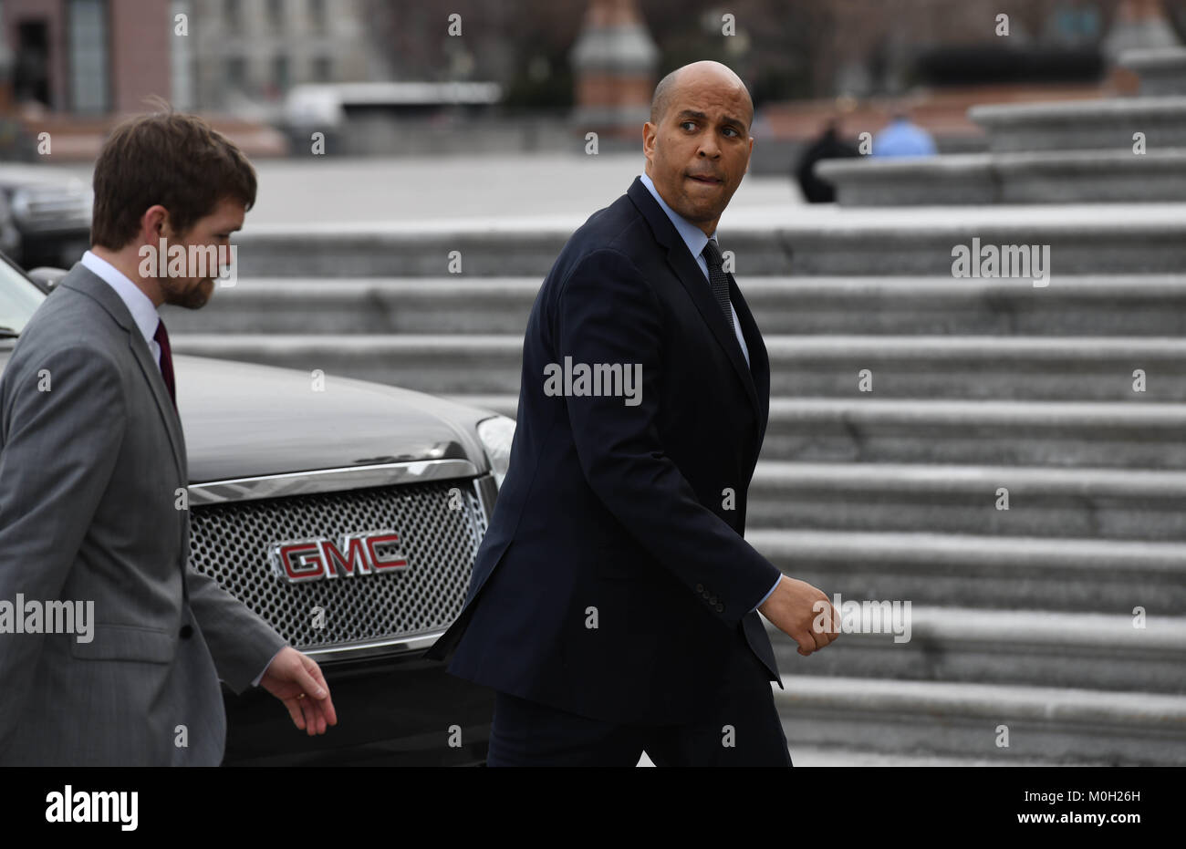 Washington, District of Columbia, USA. 22nd Jan, 2018. Senator COREY BOOKER(D-NJ) walks into the Senate chamber Monday for a vote that would end the three-day old U.S. government shutdown after Senate Democrats joined Republicans in supporting a deal on immigration and spending. Credit: Miguel Juarez Lugo/ZUMA Wire/Alamy Live News Stock Photo