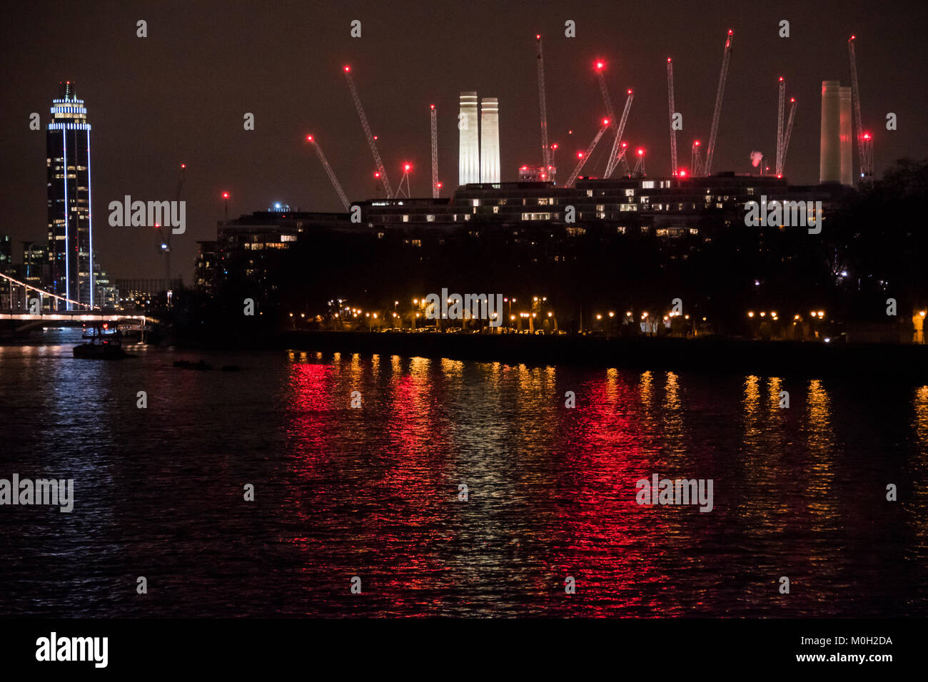 Battersea, UK. 22nd Jan, 2018. The Battersea Power Station development at night. A sea of cranes. Credit: Guy Bell/Alamy Live News Stock Photo